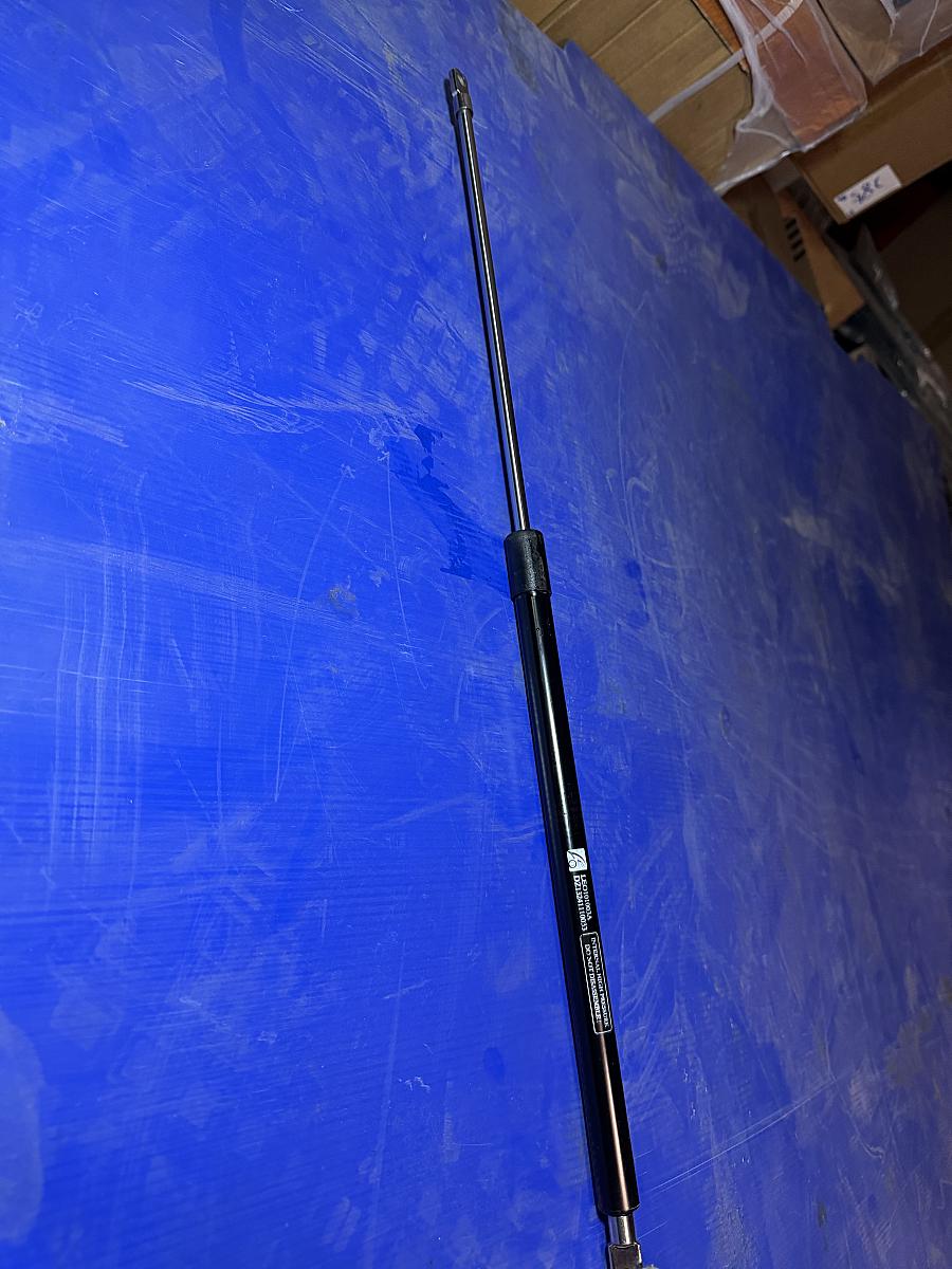 Амортизатор капота LEO101003A для SHACMAN F3000 (LEO Trade)