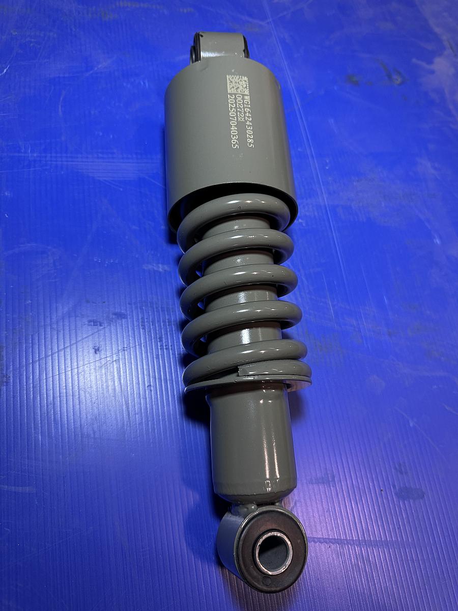 Амортизатор кабины передний нерегулируемый с пружиной HOWO WG1642430285